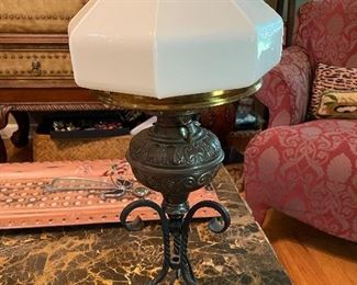 Electrified antique kerosene lamp.