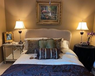 King size upholstered bed (box springs and mattress not included).