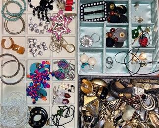 100’s of costume jewelry pieces, some new with tags.