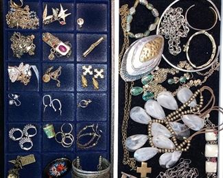 100’s of costume jewelry pieces, some new with tags.