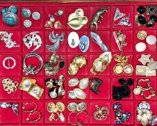 100’s of costume jewelry pieces, some new with tags.