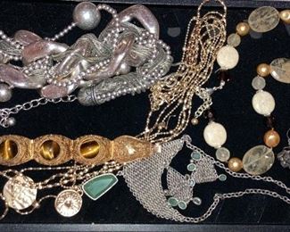 100’s of costume jewelry pieces, some new with tags.