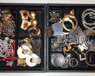 100’s of costume jewelry pieces, some new with tags.