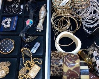 100’s of costume jewelry pieces, some new with tags.