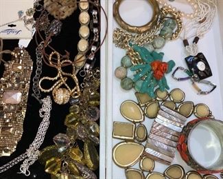 100’s of costume jewelry pieces, some new with tags.