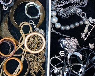 100’s of costume jewelry pieces, some new with tags.