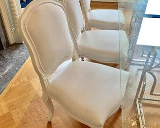 $1,200 - Six CB2 dining chairs. 38.5"H x 21"W x 20.5"D. Height to seat approximately 18.5".  Some cushions have tiny spots. 
