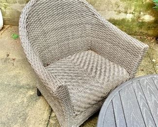 $300 - Pair of woven  resin conversation chairs - 34.5"H x 30"W x 28"D. Height to seat is approximately 17.5". 