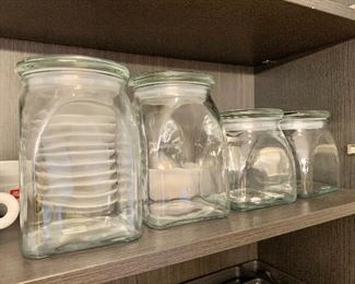Crate and Barrel glass canisters - $18 each - 2 large (approx. 8"H x 5" square) and  $10 each  - 2 small (approx 6"H x 5" square)