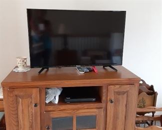 flat screened t.v. with entertainment center