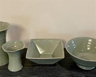 Item 81:  Simon Pearce Celadon Pottery:                                                                               a.  Tall Vase (1st from left):  5.25" x 8.25": $85                                                                                b.  Small Vase (2nd from left):  $65                                                                                c.  Square Bowl (3rd from left):  $28                                                                          d.  Fruit Bowl (4th from left):  9" x 4": $65