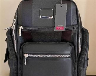 Item 99:  Tumi Sheppard Deluxe Brief Pack (NWT):  $345