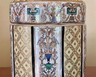 Item 110:  Hand Painted Jar with Pinecone Finial - 8": $38