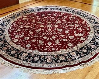 Item 51:  Round Burgundy and Black Wool Rug - 112.5": $895