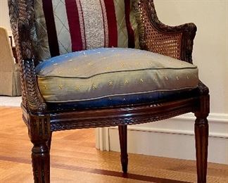 Item 55:  Vintage Double Caned Armchair with Elaborate Carving and Down Cushion - 24.5"l x 21"w x 39"h:  $450