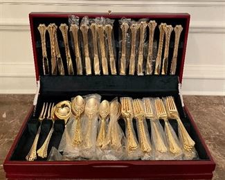 Item 151:  F.B. Rogers Goldwash Silverware Set:   $125                                                                      16 knives, 16 dinner forks, 16 salad forks, 16 soup spoons, 16 teaspoons, soup ladle, serving set, butter knives, sugar spoon