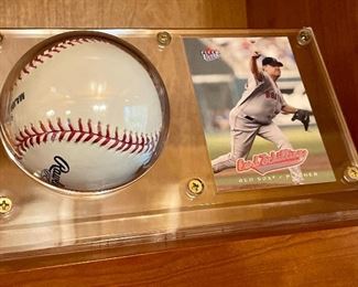 Item 165:  Autographed Curt Schilling Baseball & Card:  $50