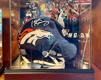Item 171:  Autographed Peyton Manning Mini Helmet:  $500