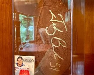 Item 186:  Autographed Tedy Bruschi Football & Card:  $100