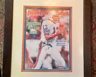 Item 189:  Autographed Dan Marino Sports Illustrated - 15" x 18":  $150