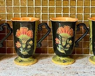 Item 299:  (4) Coffee Mugs with Orange Flower: $24