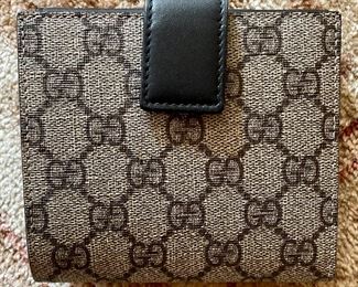Item 358:  Gucci Brown Monogram Canvas Bi Fold Wallet, New Without Tags: $250