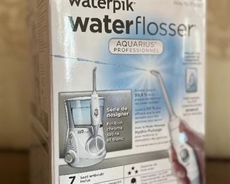 Item 502:  Waterpik Waterflosser (NIB):  $48
