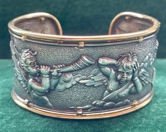Item 488:  Gorgeous Sterling Silver Repousse Cuff Bracelet with 18K Rim:  $925