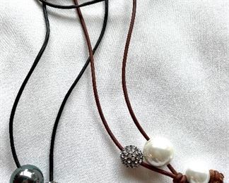 Item 469:  (2) Bead Necklaces, one on black cord and one on black cord: $28 ea