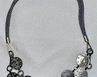 Item 474:  Great Silver Tone and Fabric Cord Necklace: $65