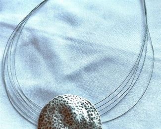 Item 475:  Silver Tone Pendant on Liquid Silver Multi-Strand Necklace: $42