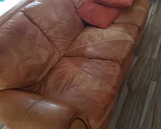 Real leather sofa, shows some wear but is in very good, comfortable, condition