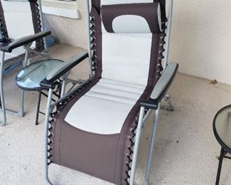 One of three pool or lanai chairs, tables sold separately