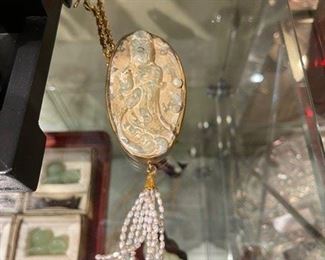 Antique carved stone and rice pearl necklace