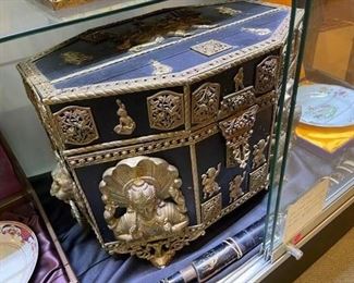 Large antique chest covered in heavy bronze