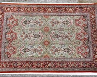 Another signed silk Persian rug in this sale.