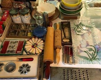 Kitchen packed with a wide array of vintage cookware, utensils, etc.