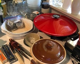 Kitchen packed with a wide array of vintage cookware, utensils, etc.