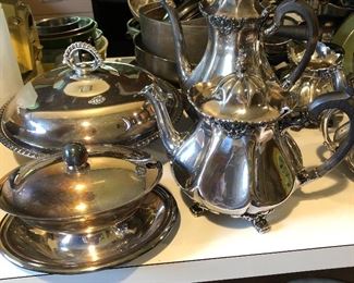 Large selection of vintage silverplate cookware and dinnerware.