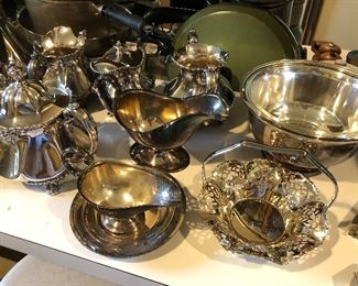 Large selection of vintage silverplate cookware and dinnerware.