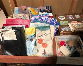 Scores of vintage fabric and other textiles to be sold.