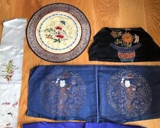 Sampling of embroidered textiles from China and Japan to be sold.