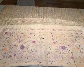Antique embroidered table throw.