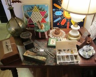 Vintage gameboards, vintage milk glass lamp, vintage poker set, vintage fishing lures, 