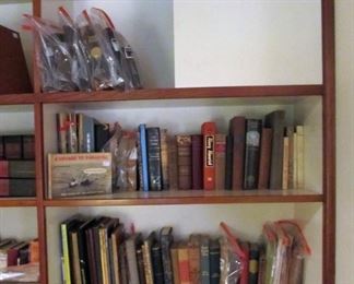 Large collection of antique books dating back to the 1800s.