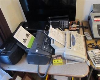 Lots of electronics - 2 fax machines - brother / HP,  Samsung TV used twice, DVD player, JVC DVD/VHS, Swintec word processor, GoTech portable DVD player, Sony Boom Box