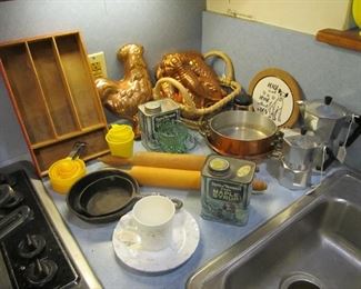 Decorative copperware, vintage tins, rolling pins, cast iron, & vintage pots & pans.