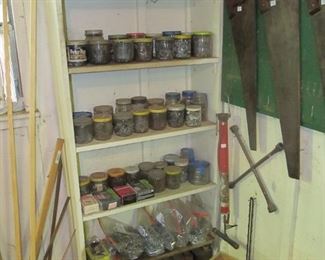 Antique tool shed - lots of antique & vintage tools.  lots of hammers, planes, chisels, files, saws, nails, screws, screwdrivers, pliers, bit sets, antique toolboxes, & more.