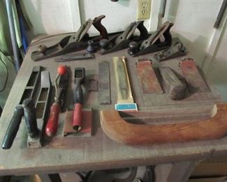 Antique tool shed - lots of antique & vintage tools.  lots of hammers, planes, chisels, files, saws, nails, screws, screwdrivers, pliers, bit sets, antique toolboxes, & more.
