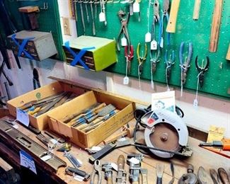 Antique tool shed - lots of antique & vintage tools.  lots of hammers, planes, chisels, files, saws, nails, screws, screwdrivers, pliers, bit sets, antique toolboxes, & more.